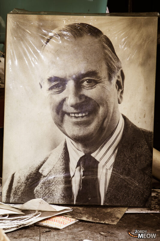 Portrait of a friendly man in suit, exuding warmth and professionalism.