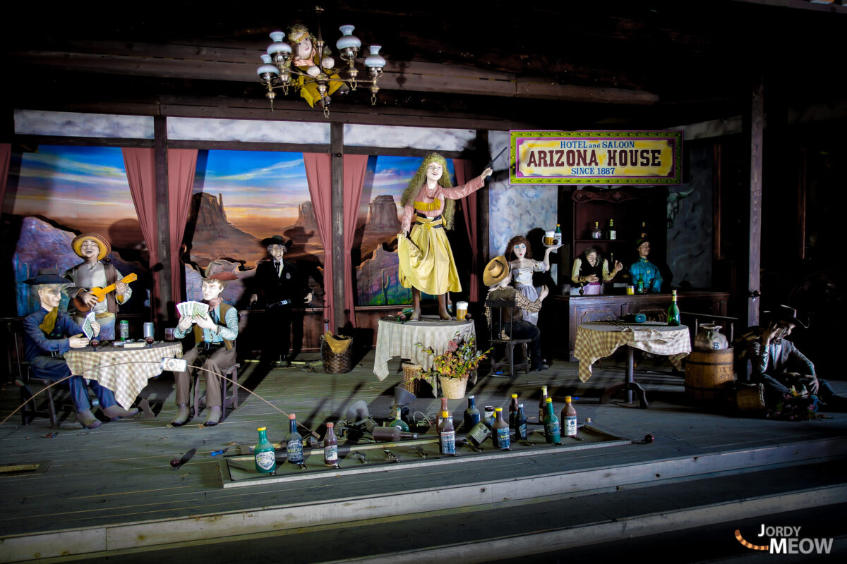 Decaying charm of abandoned Western Village theme park in old Wild West setting.