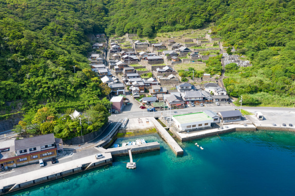 Tranquil Coastal Village with Turquoise Bay