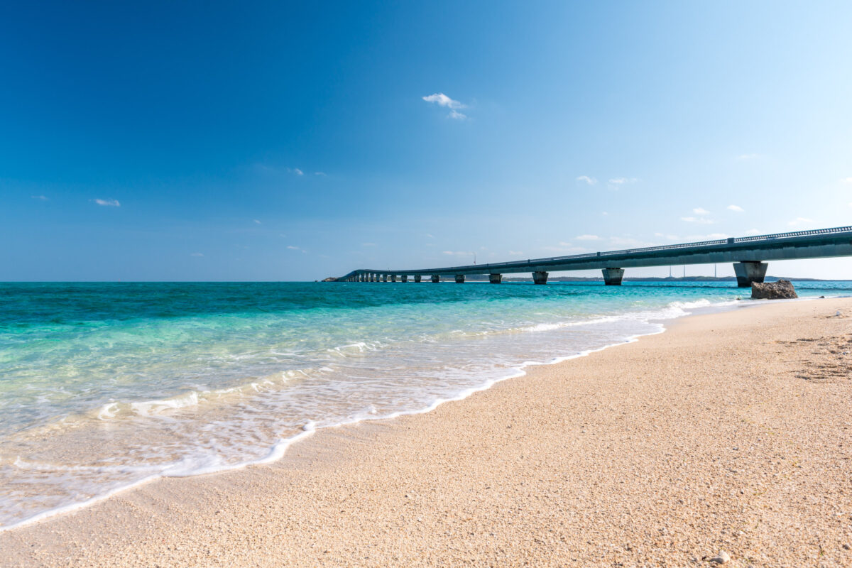 Turquoise beach on Miyako Island, Japan, with long bridge across the sea